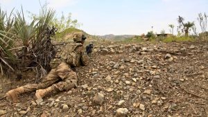 A military scout on overwatch
