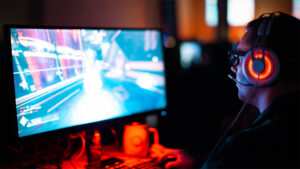 Photo of a gamer in front of a personal computer