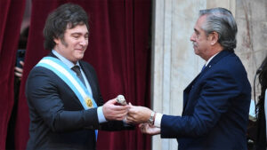 Alberto Fernández awarding Milei the presidential scepter during the inauguration on 10 December 2023