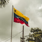 Flag of venezuela over some homes