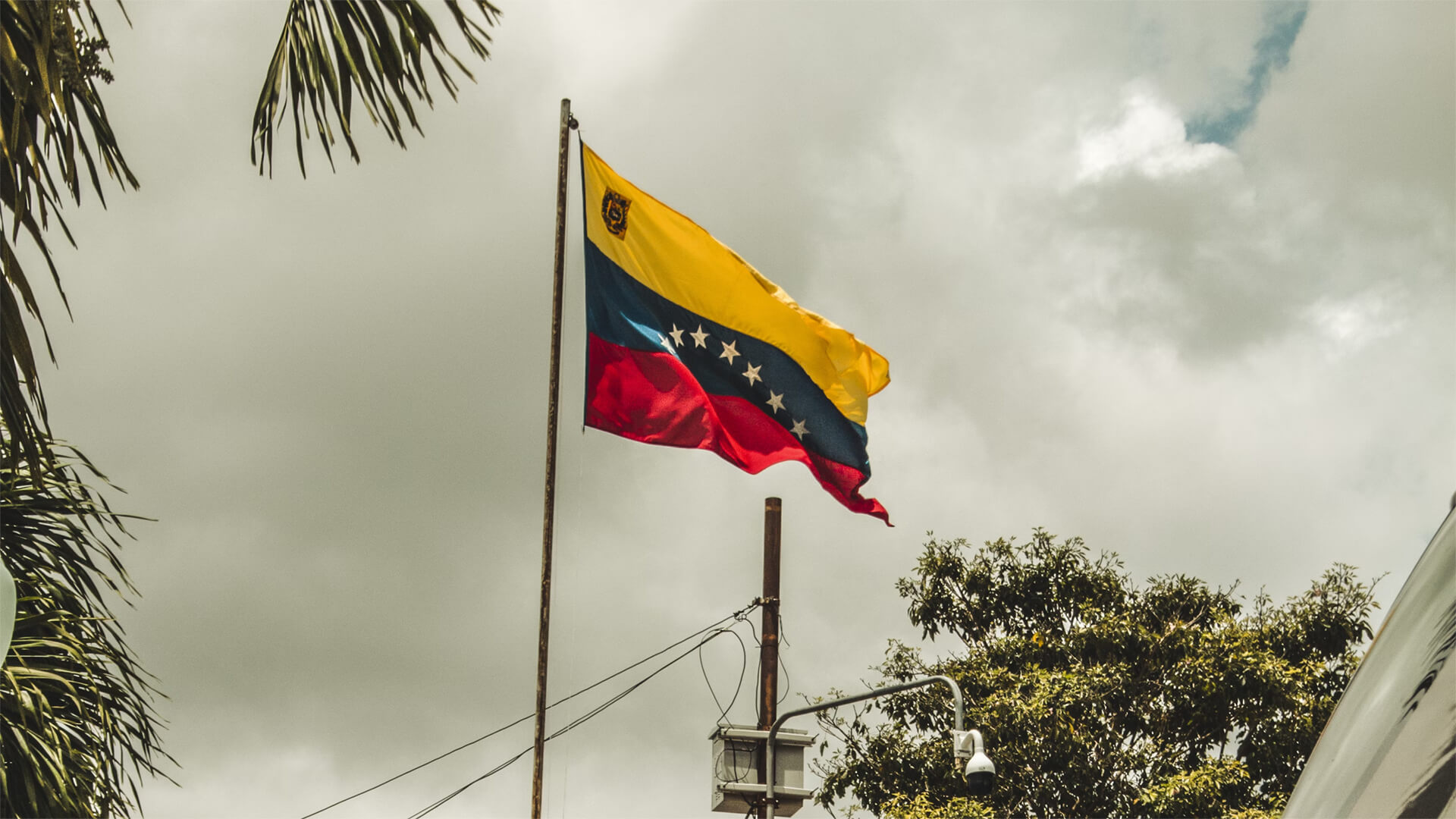 Flag of venezuela over some homes