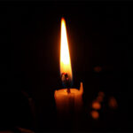 A candle in darkness