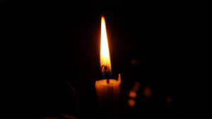 A candle in darkness