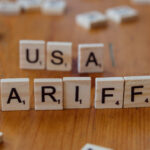 Scrabble pieces showing the words USA and Tarrifs