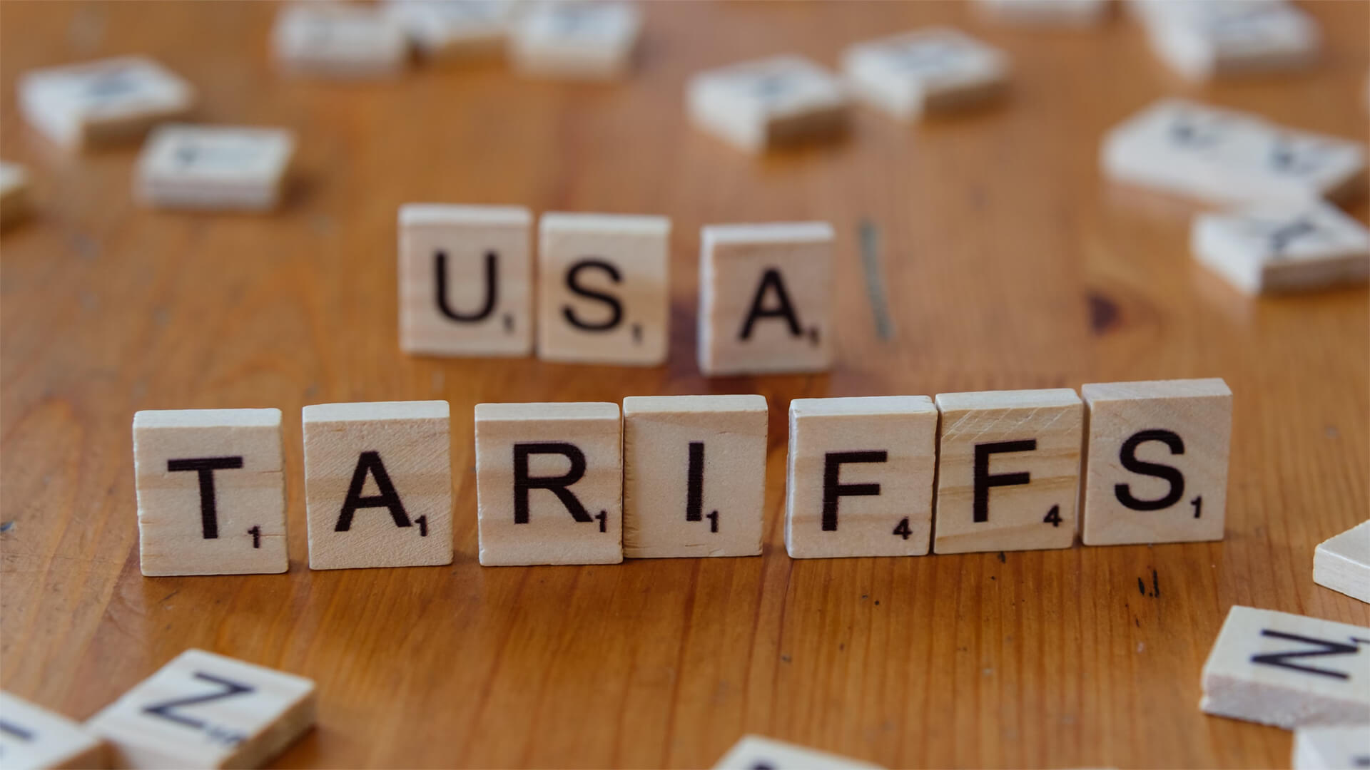 Scrabble pieces showing the words USA and Tarrifs