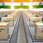Made in India. Cardboard boxes with text made in India and indian flag on the roller conveyor. Licensed by Envato Elements: https://elements.envato.com/made-in-india-cardboard-boxes-with-text-made-in-in-8X3N3JR