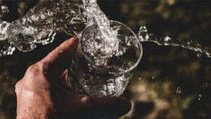 Water sloshing from a cup