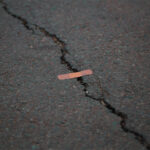 Band aid on a crack in the street