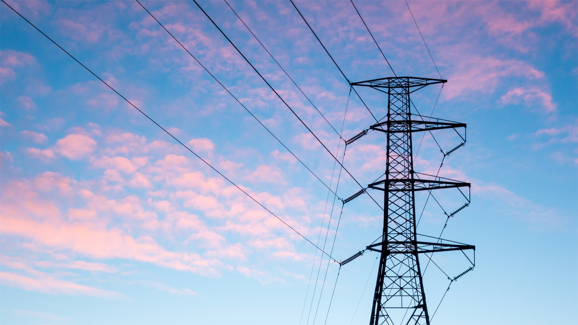 Electrical powerlines on a sunset