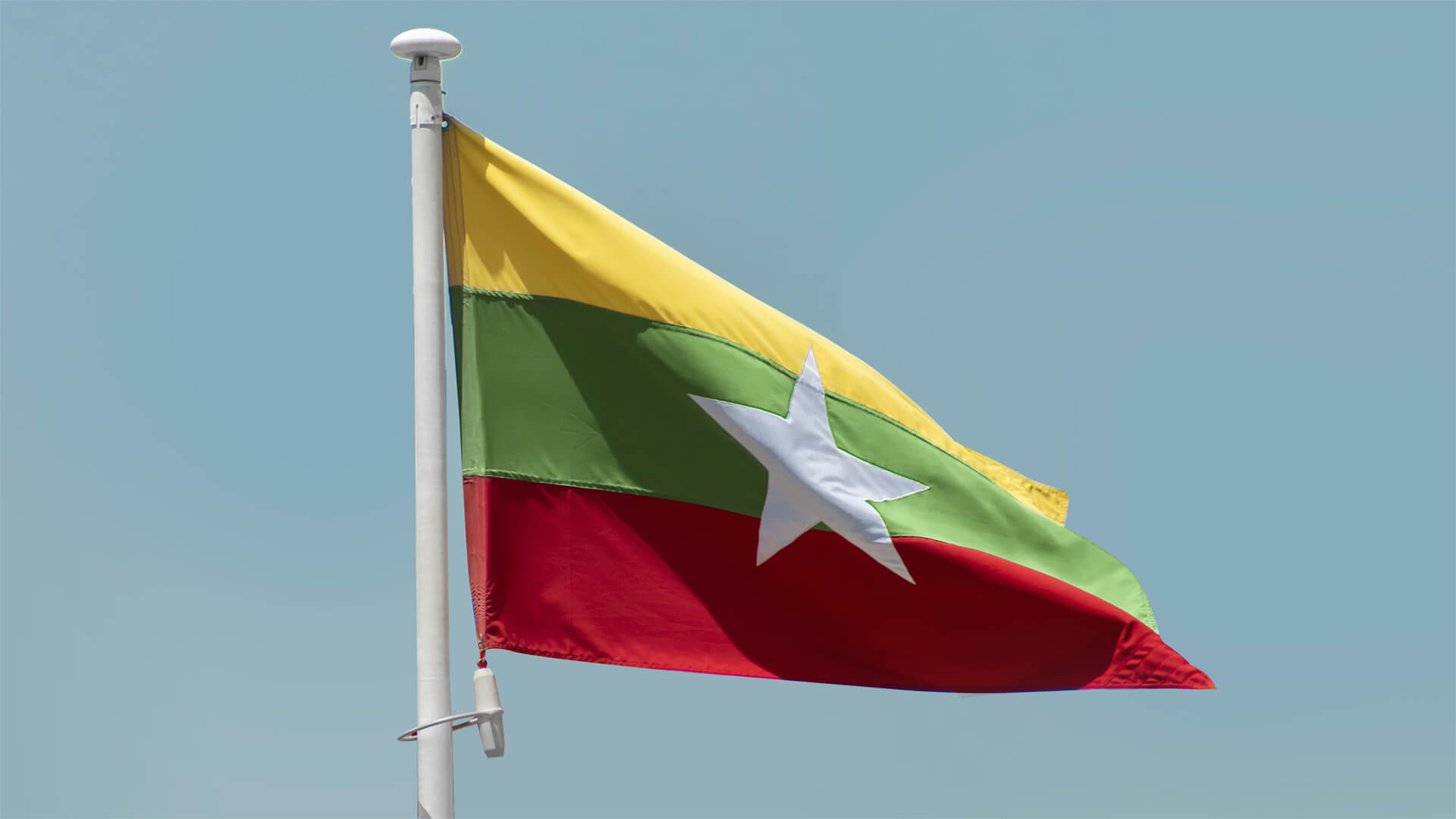 Flag of Myanmar waving in the wind