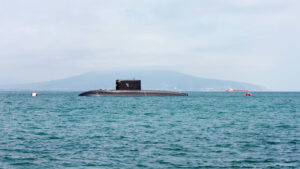 A submarine rising out of the water