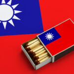 Taiwan flag is shown in an open matchbox, which is filled with matches and lies on a large flag | Licensed by Envato Elements