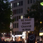 A placard calling for regime change in Iran