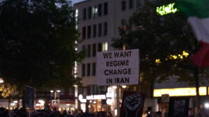 A placard calling for regime change in Iran