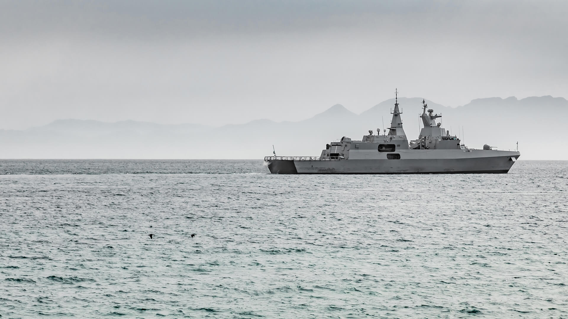 French military vessel | Licensed by Envato elements: https://app.envato.com/search/photos/d93044ee-6076-4af6-a69b-29bbfe8f6cd3?itemType=photos&term=french+navy&sort=relevance