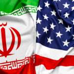 Flags of the United States and Iran blending. Licensed by Envato Elements