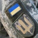 A ukraine soldiers patch/flag on their uniform