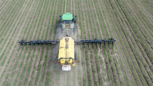 A machine fertilizing crops