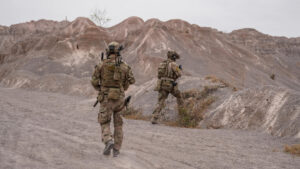 Squad of Soldiers Running Forward and Atacking Enemy During Military Operation in the Desert | Licensed by Envato Elements: https://app.envato.com/search/photos/b369387a-4bc2-43d2-808a-0341aa11dbcc?itemType=photos&term=military+desert&sort=relevance