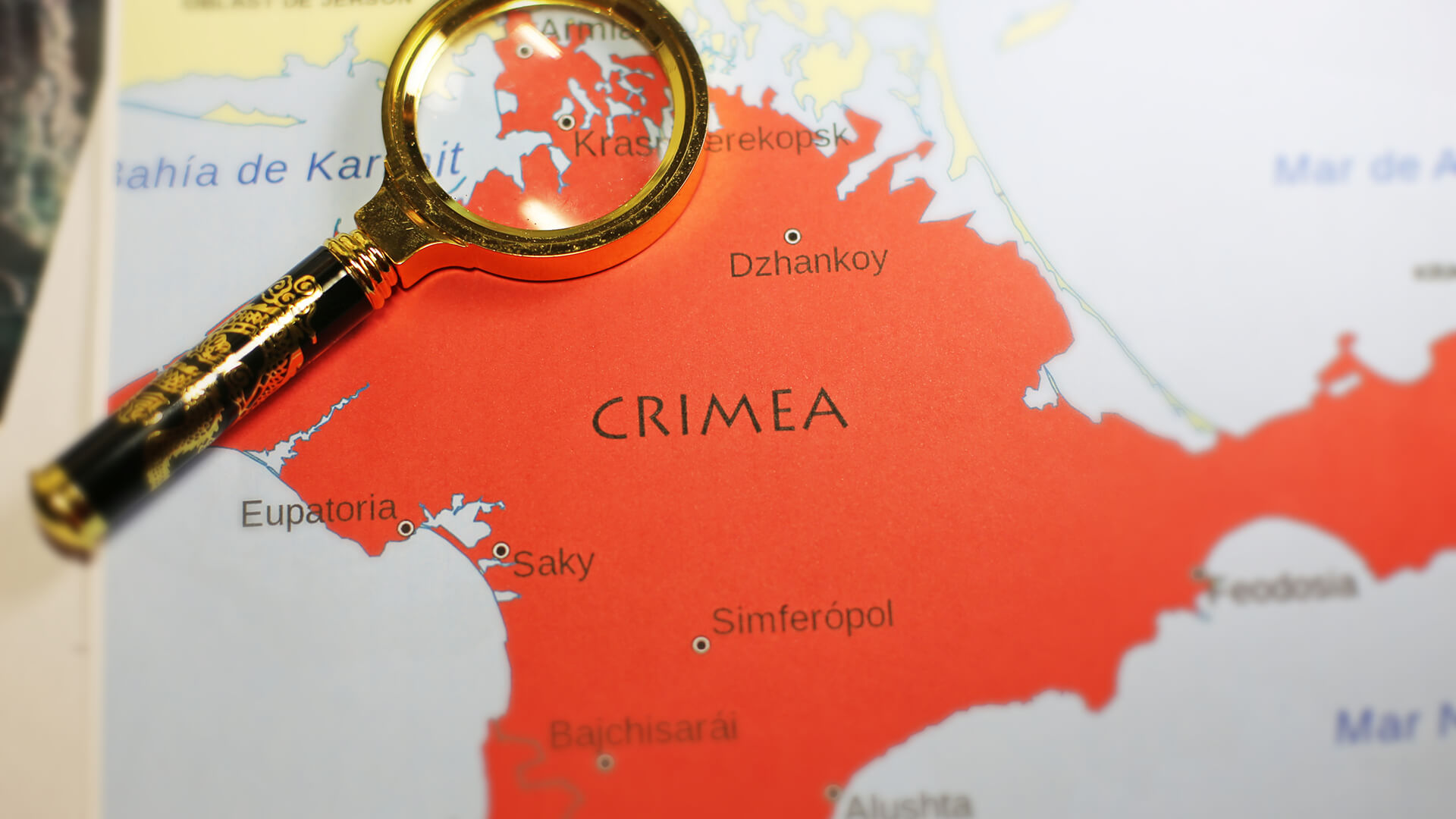 A magnifying glass on a map of Crimea | Licensed by Envato Elements