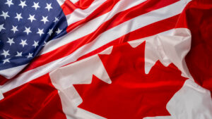 US and Canada Flags overlaid and flat | Licensed by Envato Elements