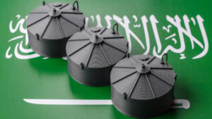 Miniature Industrial Oil Tanks on Saudi Arabian Flag | Licensed by Envato Elements
